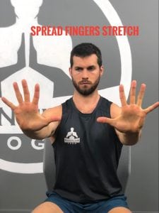 Exercises You Can Do While Sitting--Spread Fingers Stretch