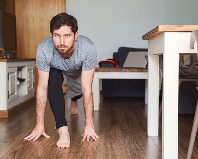 Home-Yoga-Program-for-Physical-Training-maninsportsweardoingyogaathome