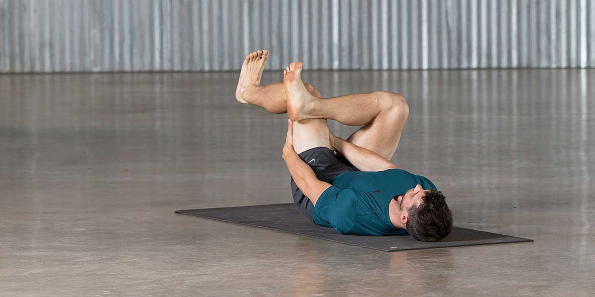 Dean Pohlman in Reclined Figure 4 demonstrating for people starting beginner yoga for men