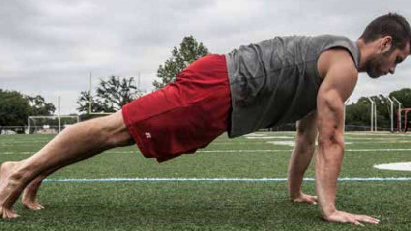 A plank pose, for people starting beginner yoga for men