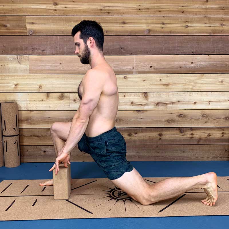 Modified runners lunge demonstrated for people starting beginner yoga for men