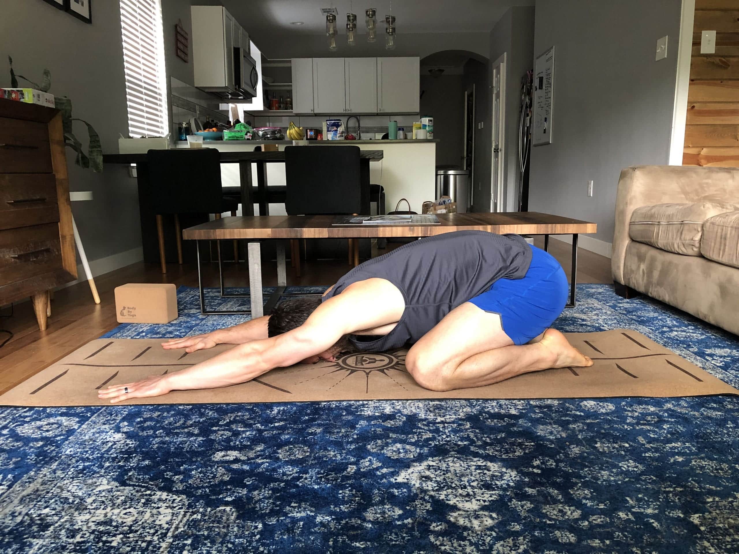 Yoga to counter sitting on the couch child's pose