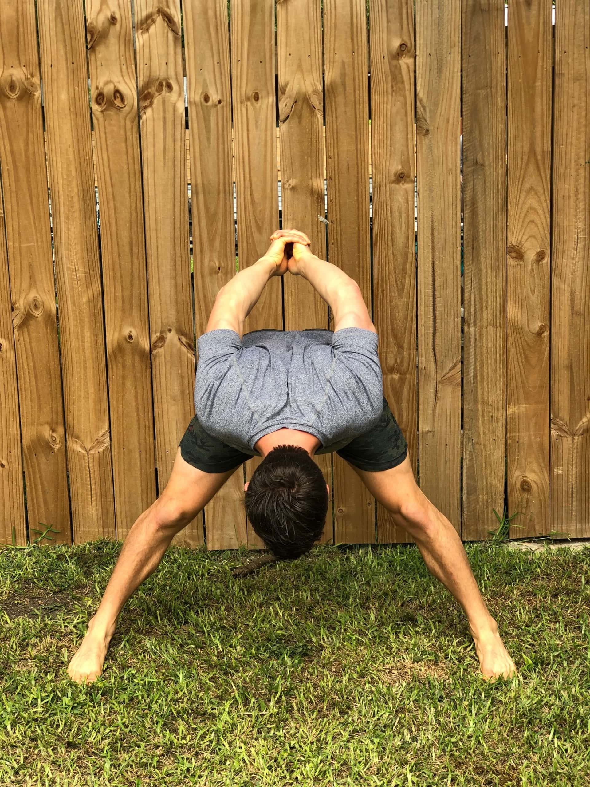 yoga for neck and shoulders wide legged forward fold